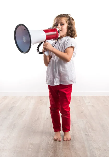 Menina gritando por megafone — Fotografia de Stock