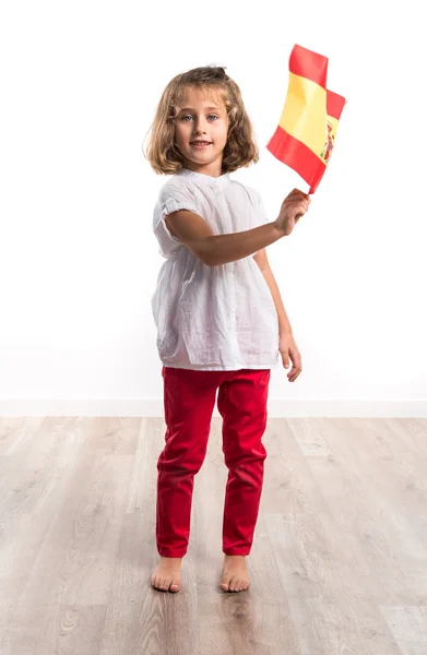 Малюк тримає іспанський прапор — стокове фото