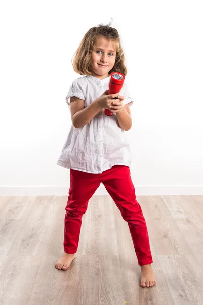 Menina segurando uma lanterna — Fotografia de Stock