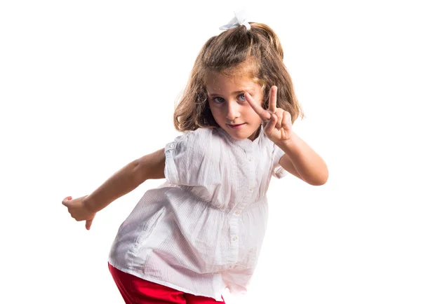 Girl doing victory gesture — Stock Photo, Image