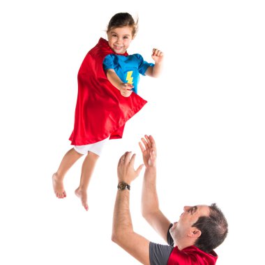 Süper kahraman gibi giyinmiş aile
