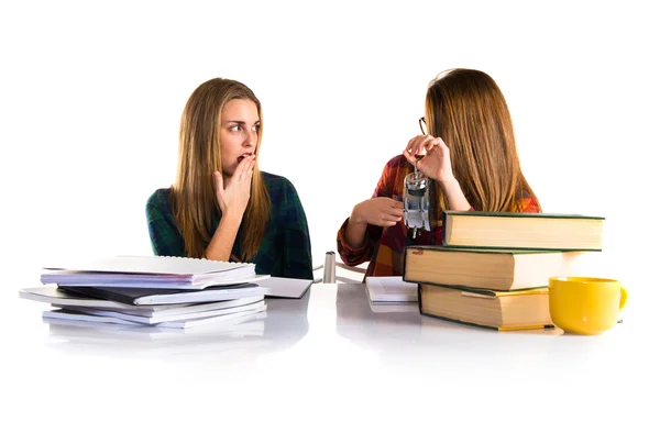 Students holding vintage clock — Stock Photo, Image