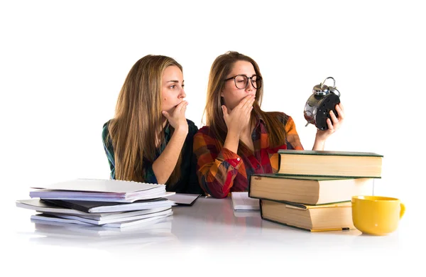 Students holding vintage clock — Stock Photo, Image