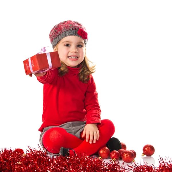 Meisje rond Kerstmis elementen — Stockfoto