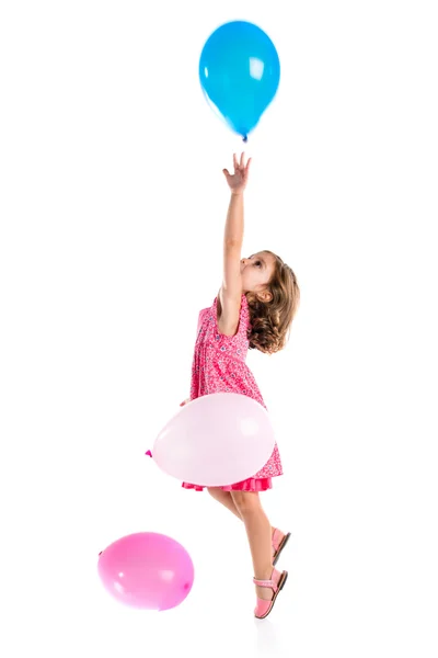 Meisje spelen met ballonnen — Stockfoto