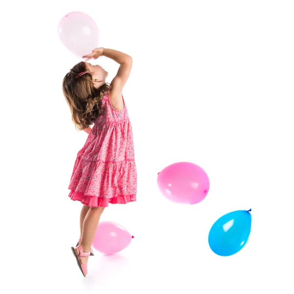 Ragazza che gioca con palloncini — Foto Stock