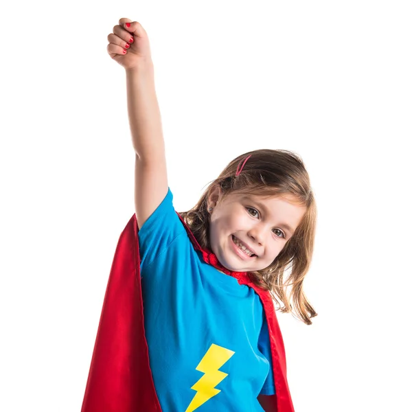 Menina vestida como super-herói fazendo gesto de mosca — Fotografia de Stock