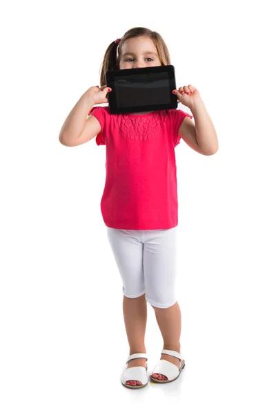 Chica sosteniendo una tableta —  Fotos de Stock
