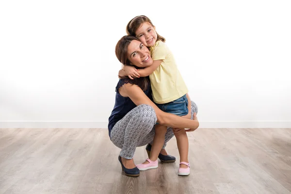 Mother and daughter in studio — Stock Photo, Image