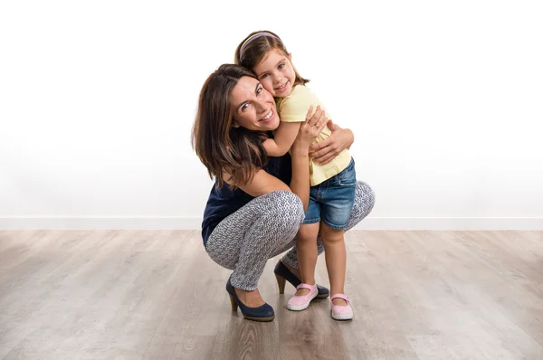 Mother and daughter in studio — Stock Photo, Image