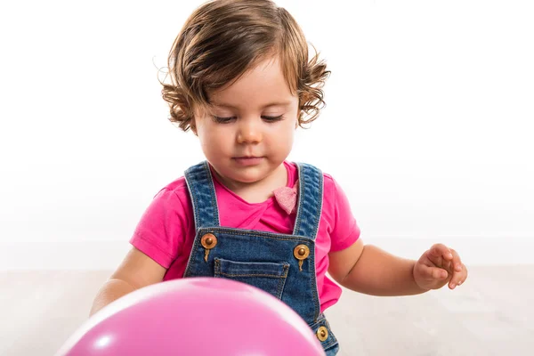 Baby in studio with balloons — Stock Photo, Image