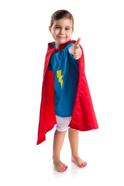 Girl dressed like superhero with thumb up Stock Image