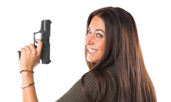 Mujer sosteniendo una pistola — Foto de Stock