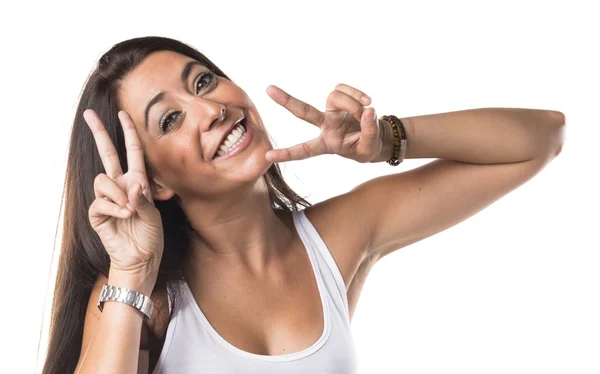 Woman doing victory gesture — Stock Photo, Image