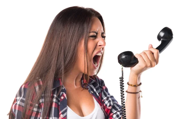 Mulher gritando para telefone vintage — Fotografia de Stock