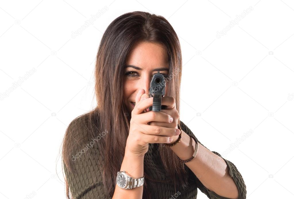 woman shooting with a pistol