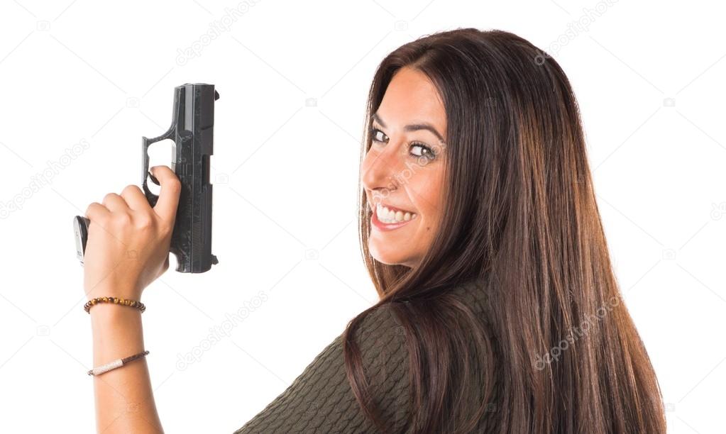 Woman holding a pistol