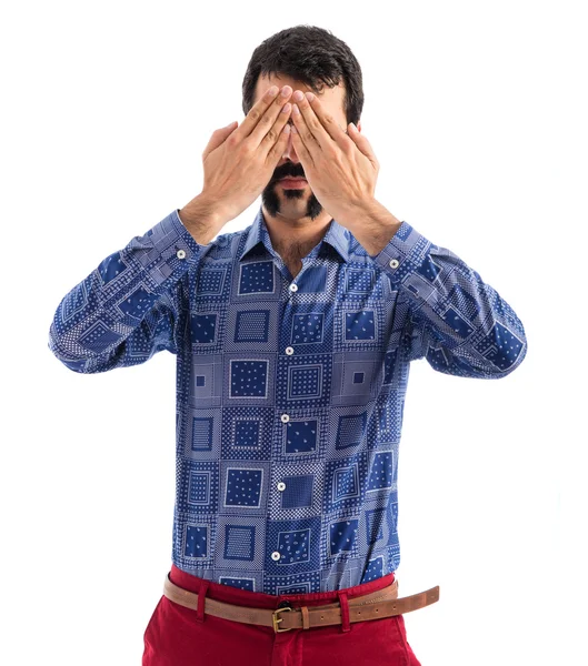 Vintage young man covering his eyes — Stock Photo, Image