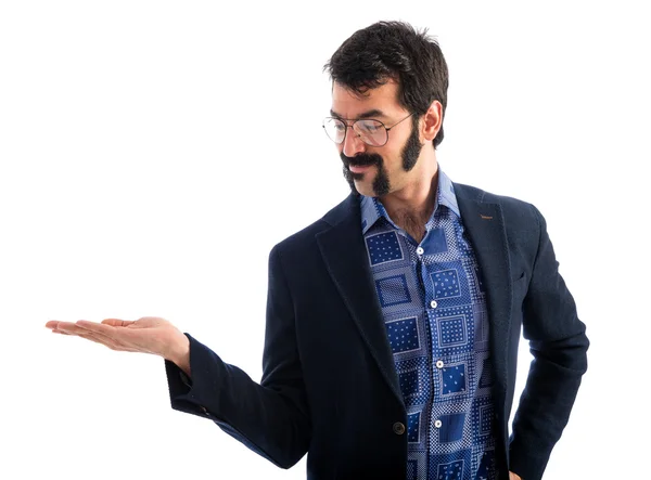 Vintage young man holding something — Stock Photo, Image