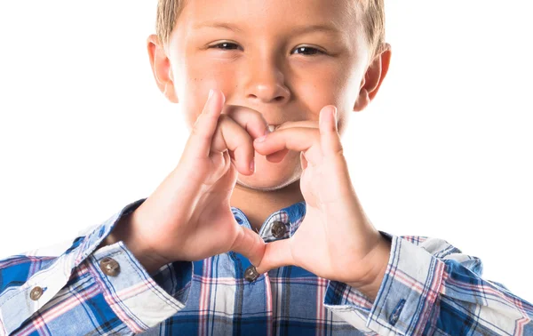 Ragazzo che fa un cuore con le mani — Foto Stock