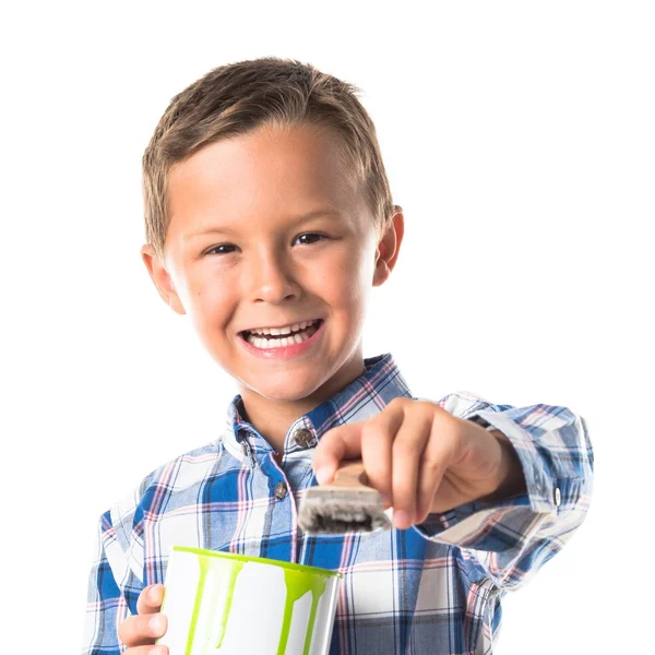 Kind hält Farbtopf in der Hand — Stockfoto