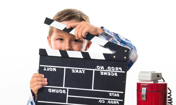 Kid with clapperboard and popcorns — Stock Photo, Image