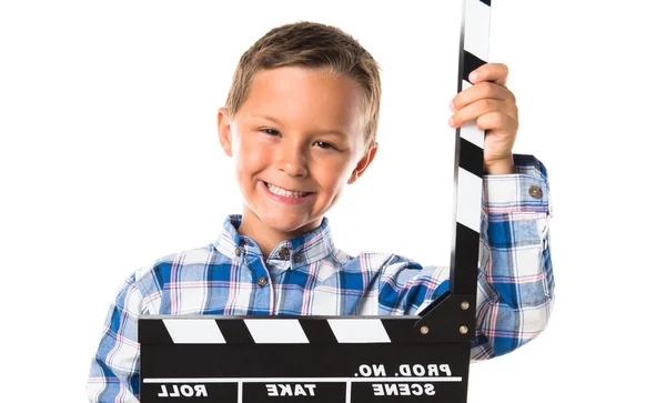 Kid hålla ett SYNKRONKLAPPA — Stockfoto