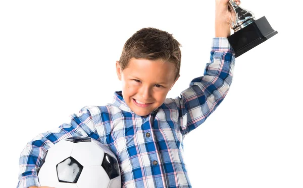 Dítě drží fotbalový pohár — Stock fotografie