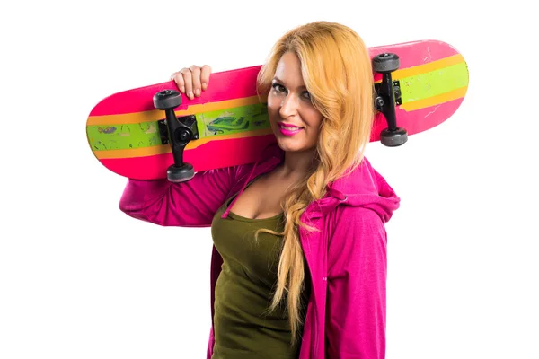 Skateboarder ragazza su sfondo bianco — Foto Stock