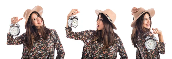 Surprised woman holding vintage clock — Stock Photo, Image
