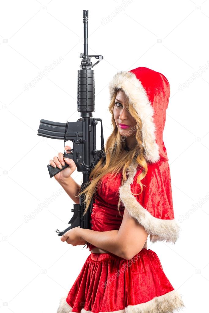 Christmas woman holding a pistol