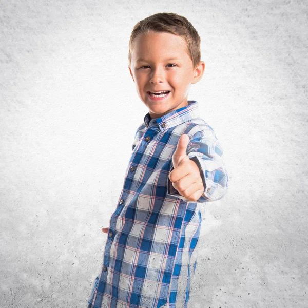 Kid with thumb up — Stock Photo, Image