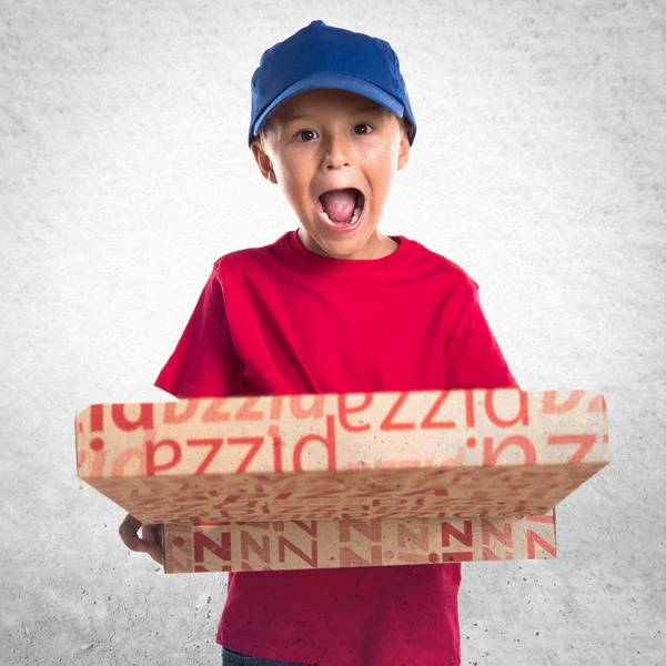 Pizza entrega garoto fazendo gesto surpresa — Fotografia de Stock