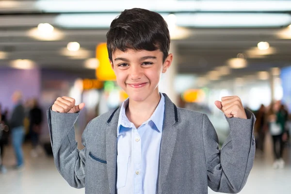 Niño afortunado sobre fondo blanco —  Fotos de Stock