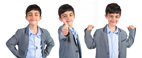 Niño con el pulgar hacia arriba — Foto de Stock