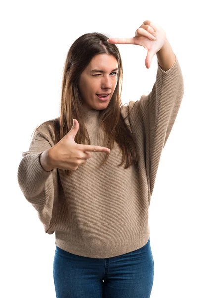 Meisje scherpstellen met haar vingers — Stockfoto