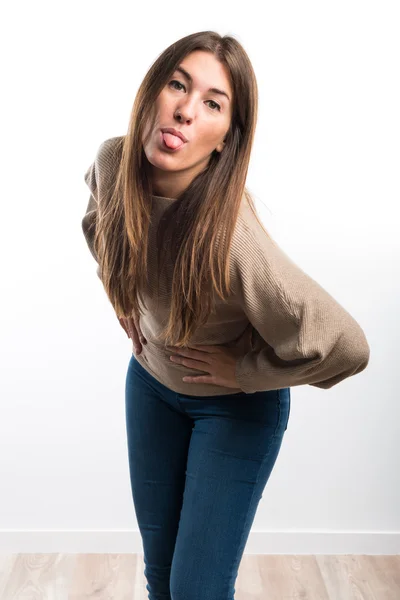 Chica sacando su lengua — Foto de Stock