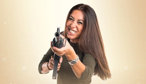 Woman shouting a SMG — Stock Photo, Image