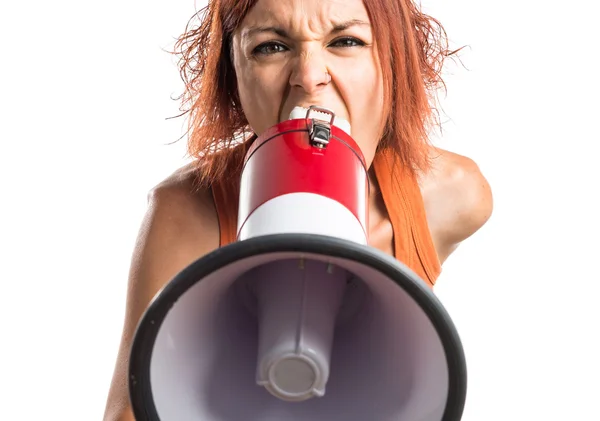 Woman shouting by megaphone — Stock Photo, Image