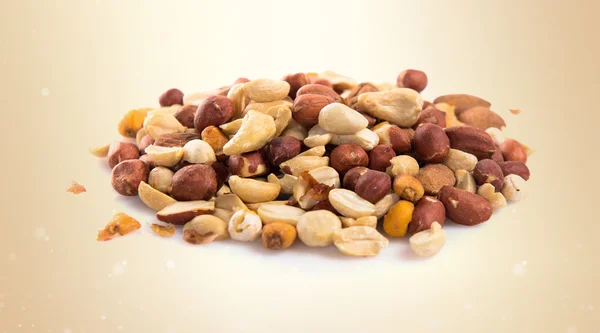 Dried fruits over ocher background — Stock Photo, Image