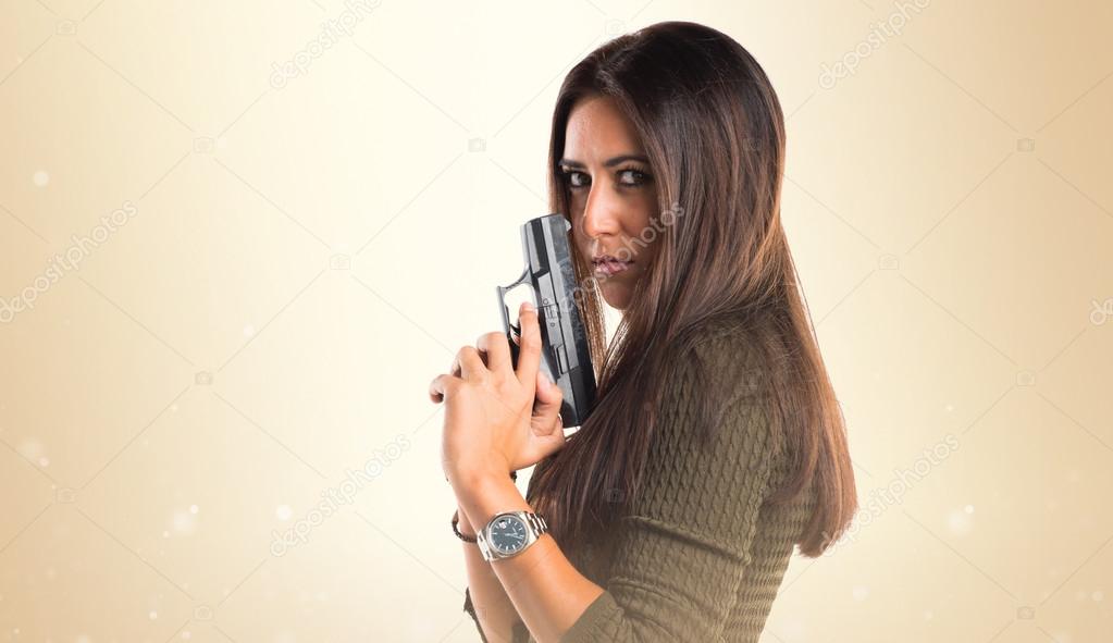Woman holding a pistol