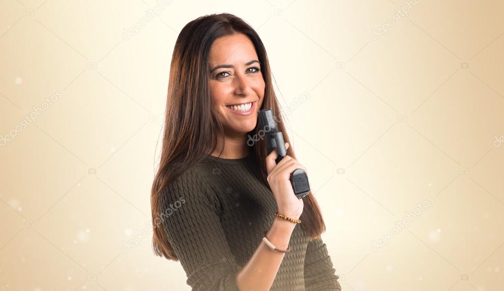 Woman holding a pistol