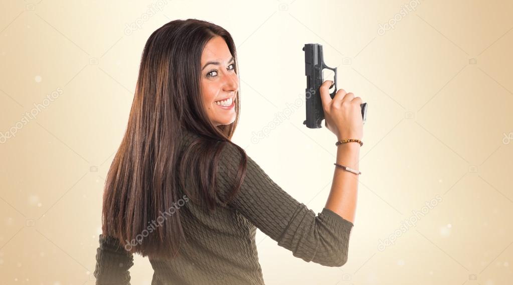 Woman holding a pistol