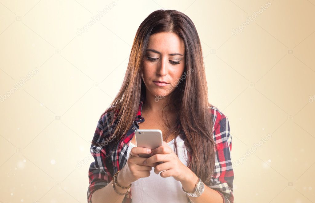 Woman writting a sms