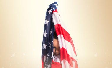 Kid holding an american flag clipart