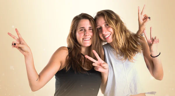 Two girls over white background — Stock Photo, Image