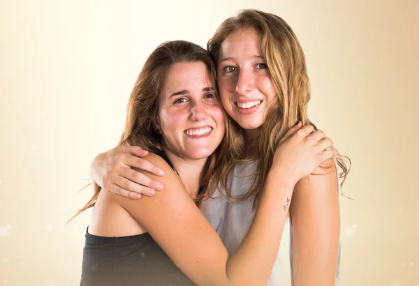 Dos chicas sobre fondo blanco — Foto de Stock