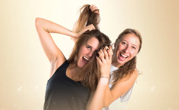 Duas meninas sobre fundo branco — Fotografia de Stock