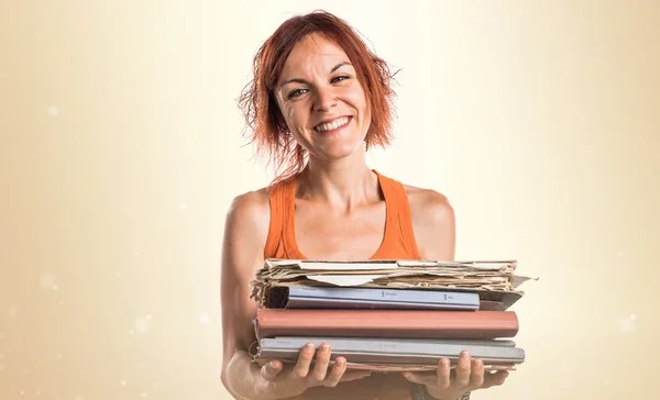 Woman holding several college notes — Stock Photo, Image