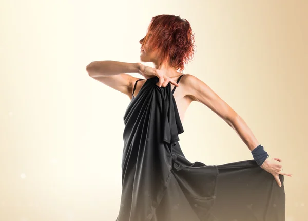 Redhead Woman over ocher background — Stock Photo, Image